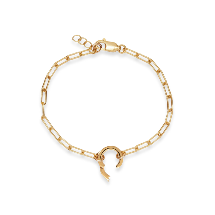 Gold chain bracelet with a unique clasp on a white background