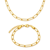 Gold chain necklace and bracelet on a white background