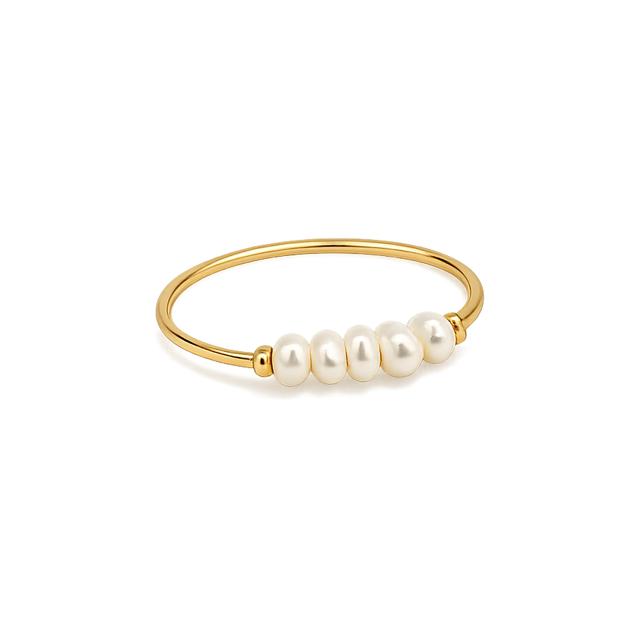 Gold ring with pearls on a white background
