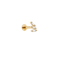 Gold earring with clear gemstones on a white background