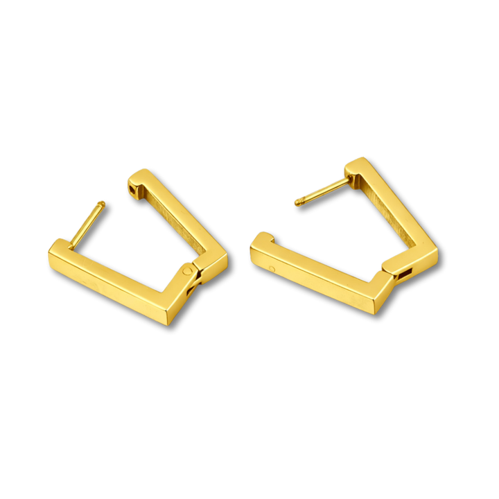 Gold hoop earrings on a white background