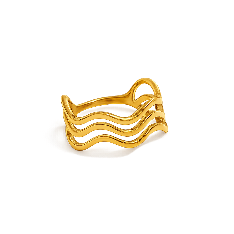 Gold ring with wavy design on a white background
