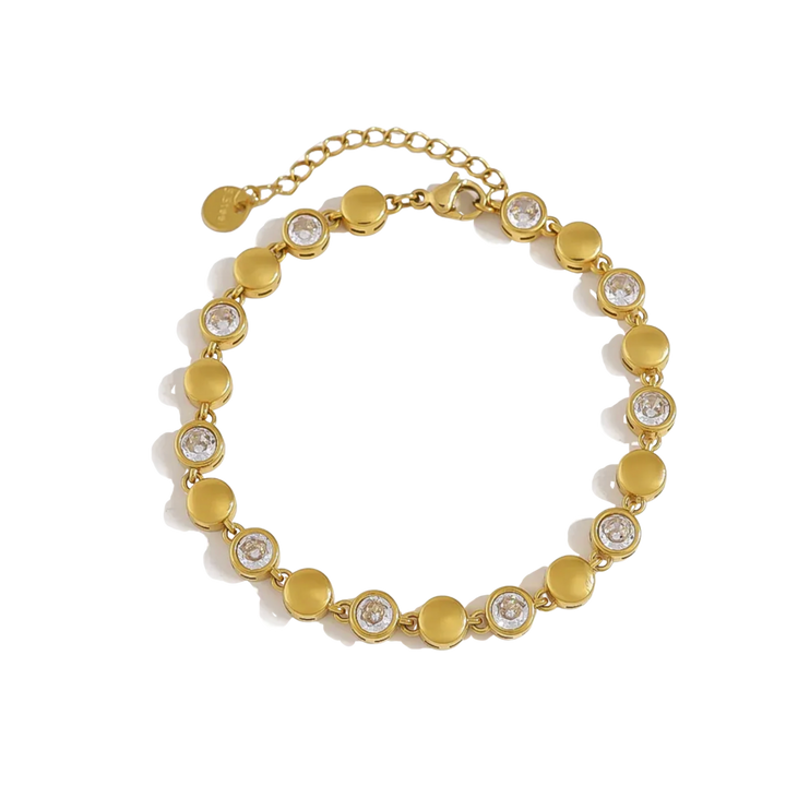 A gold-plated beaded bracelet featuring alternating flat round discs and circular settings with clear round-cut stones, displayed on a clean white background.