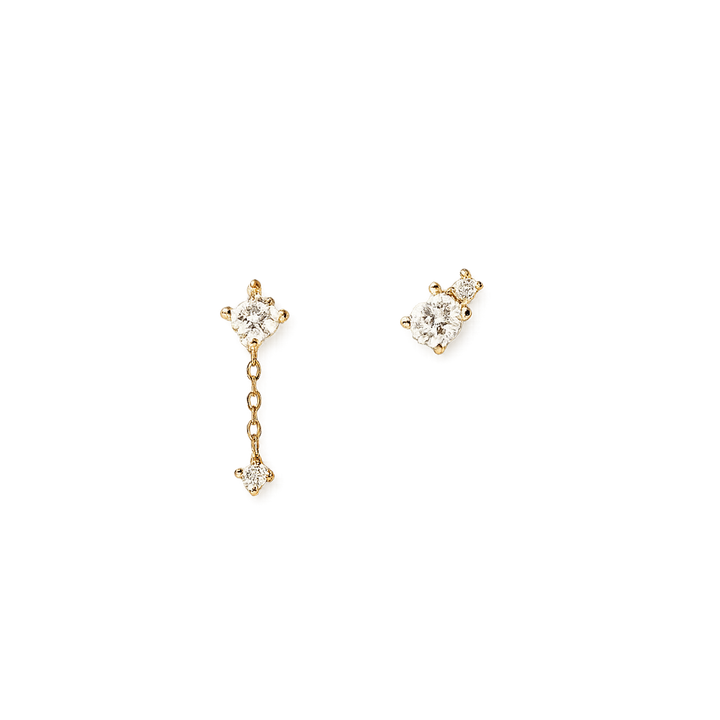 Gold earrings with diamond accents on a white background
