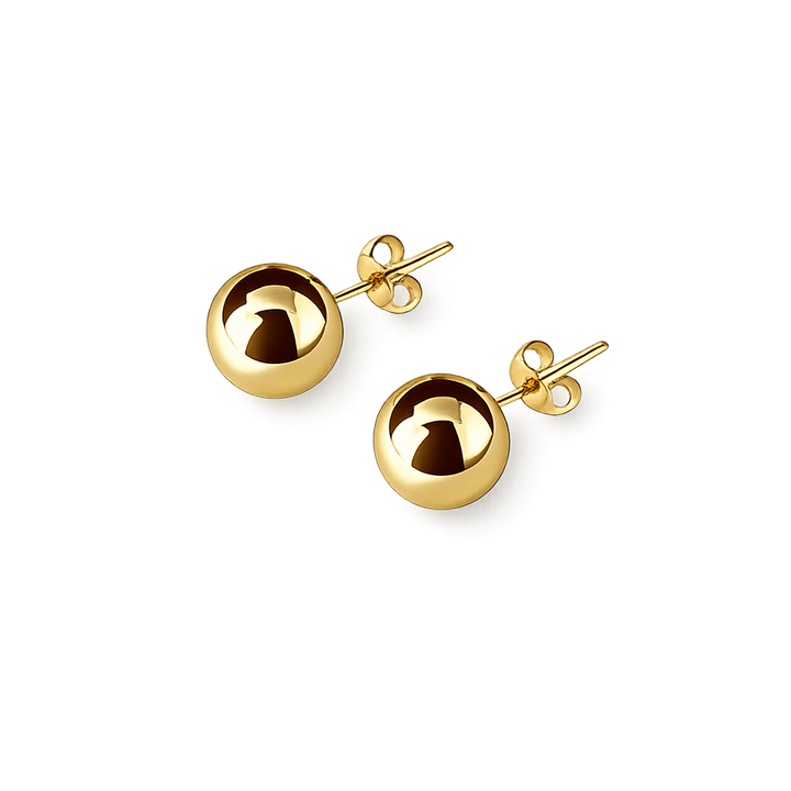 Gold ball earrings on a white background