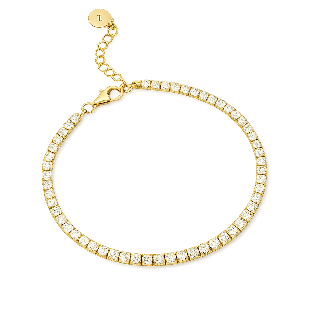 Gold tennis bracelet with clear stones on a white background