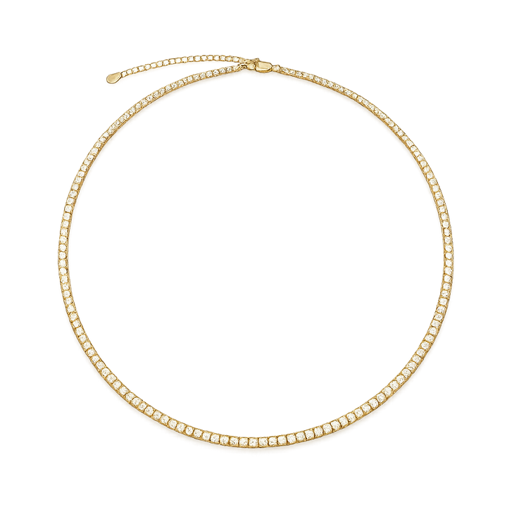 Gold necklace with small diamonds on a white background