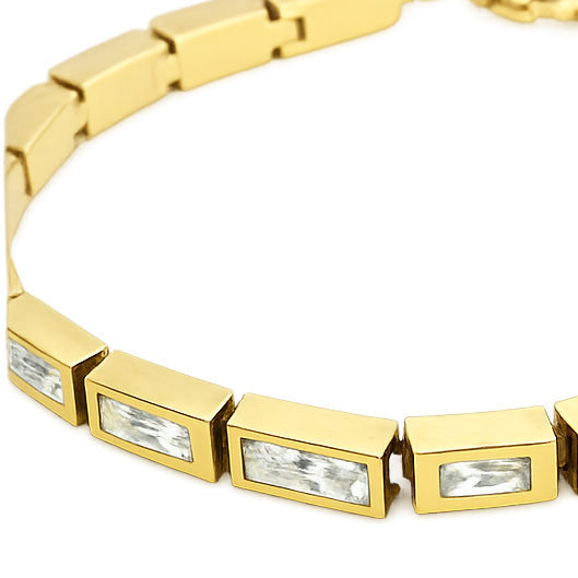 Gold bracelet with rectangular gemstones on a white background