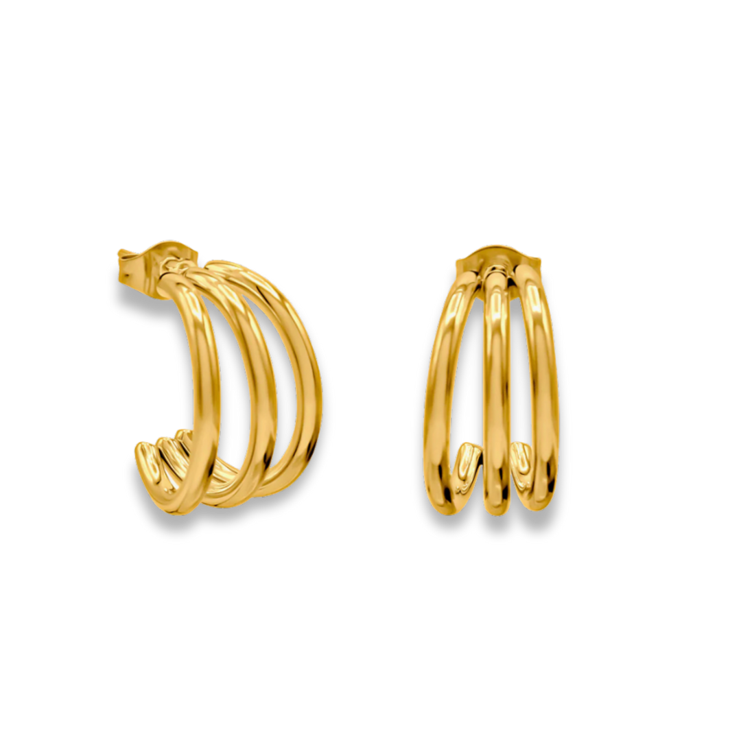 Gold hoop earrings on a white background