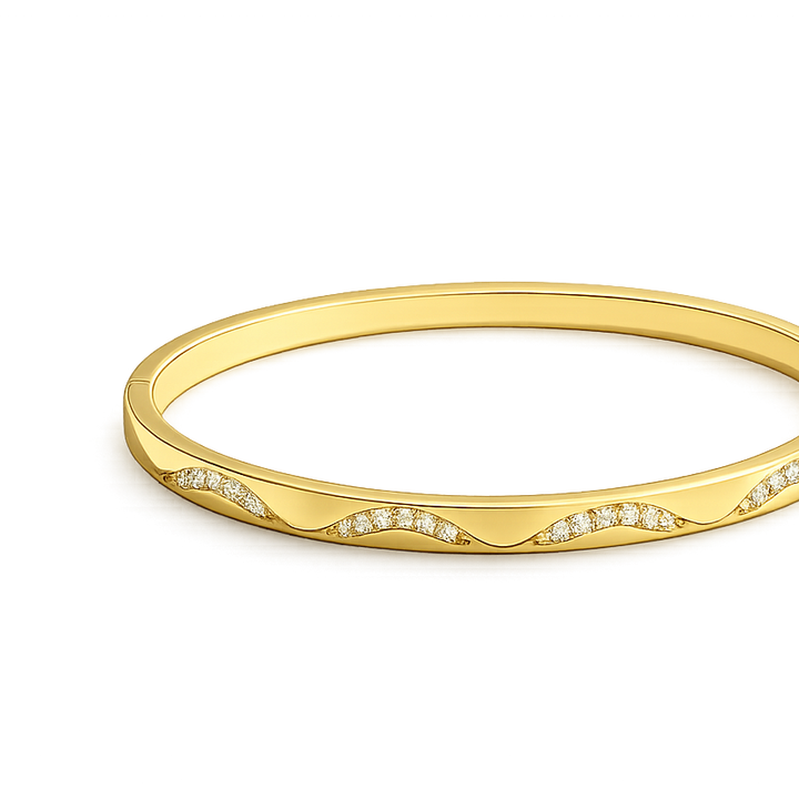 Gold bracelet with small diamonds on a white background