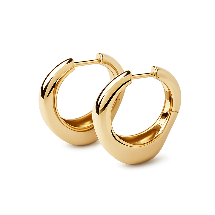 Gold hoop earrings on a white background