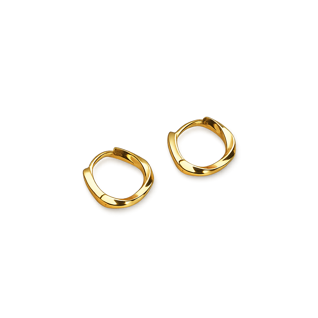 Gold hoop earrings on a white background