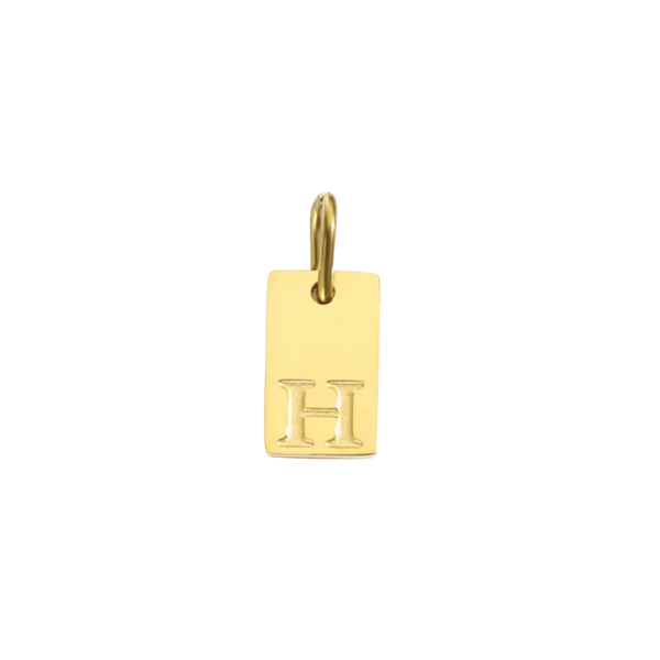 Gold pendant with 'H' on a white background