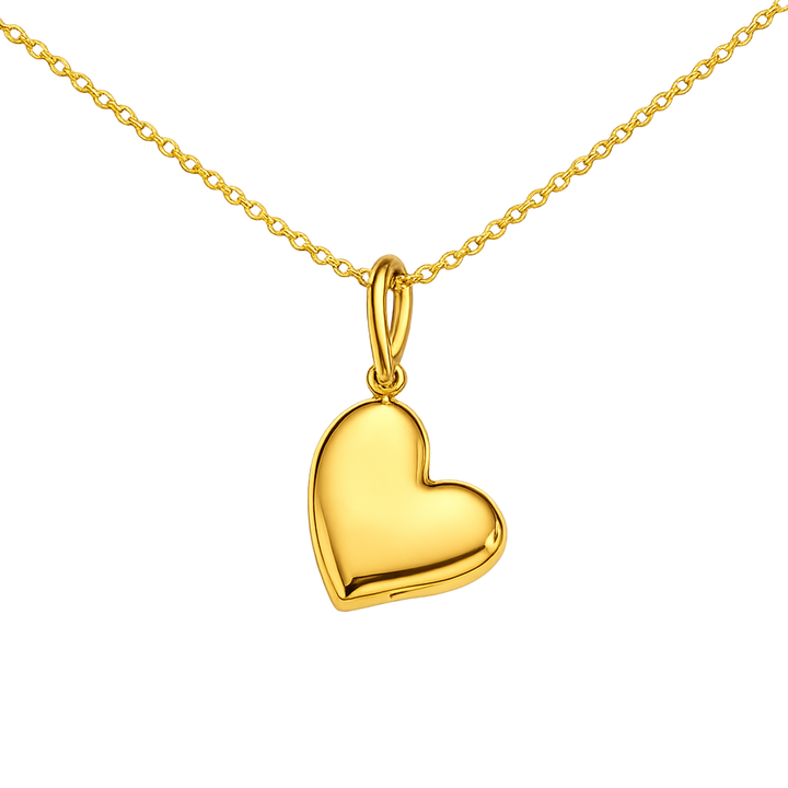 Gold heart-shaped pendant on a gold chain against a white background