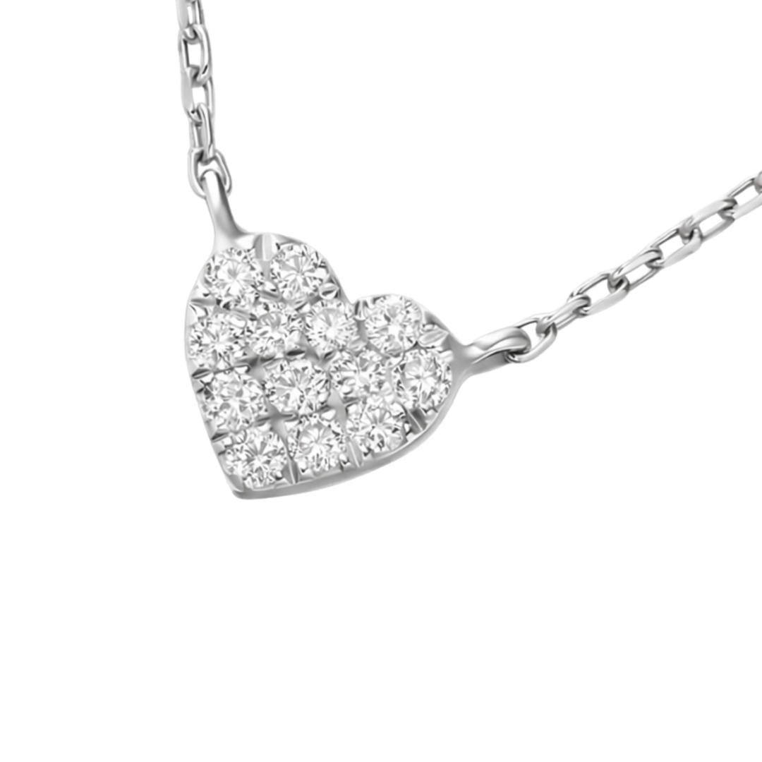 Heart-shaped diamond pendant on a white background