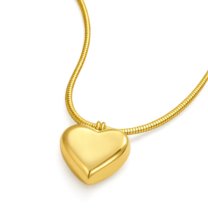 Gold heart-shaped pendant on a white background gift for her