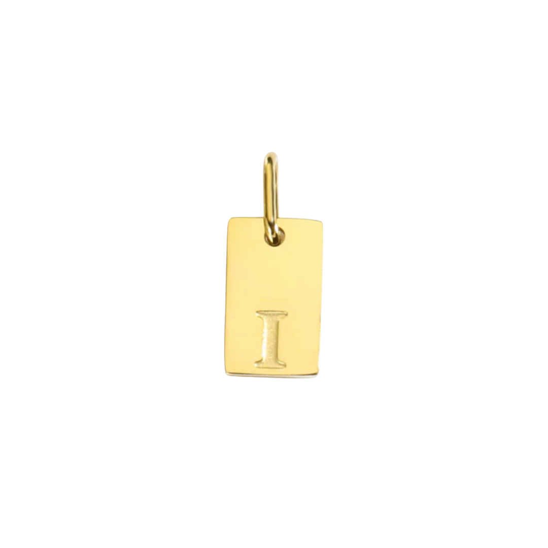 Gold pendant with letter 'I' on a white background