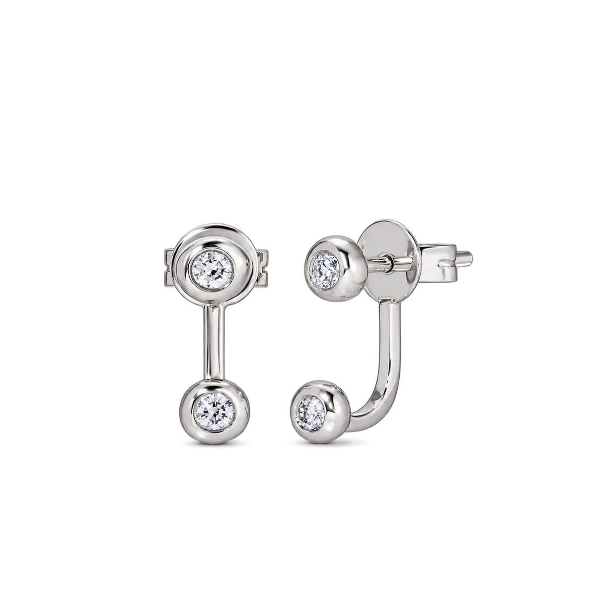 A pair of silver-toned labret earrings with round bezel-set clear gemstones, shown from front and side angles on a plain white background.
