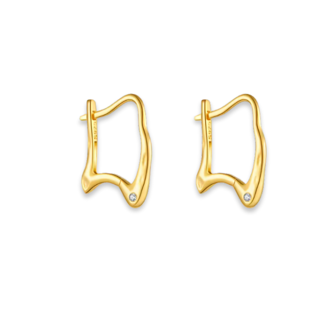 Gold hoop earrings with small diamonds on a white background