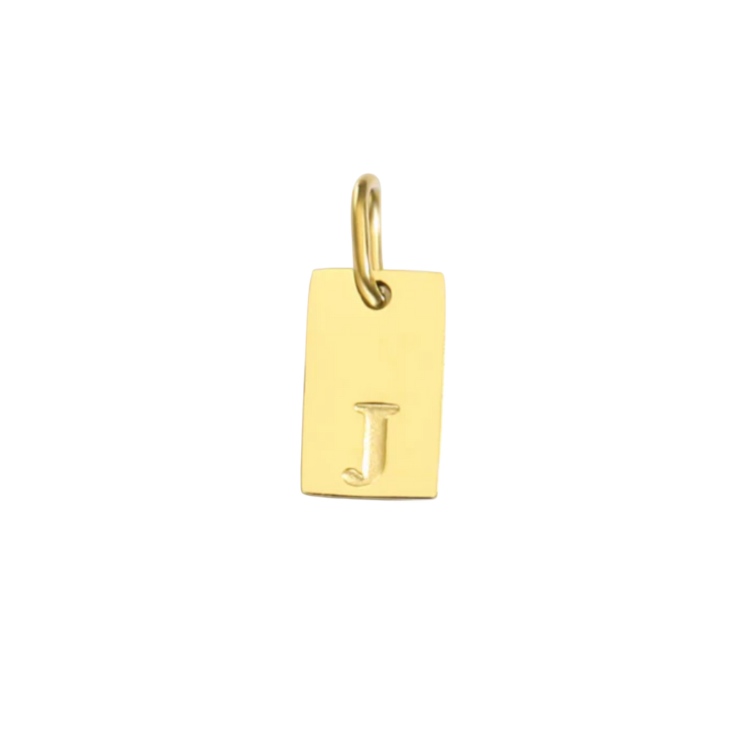Gold pendant with letter 'J' on a white background