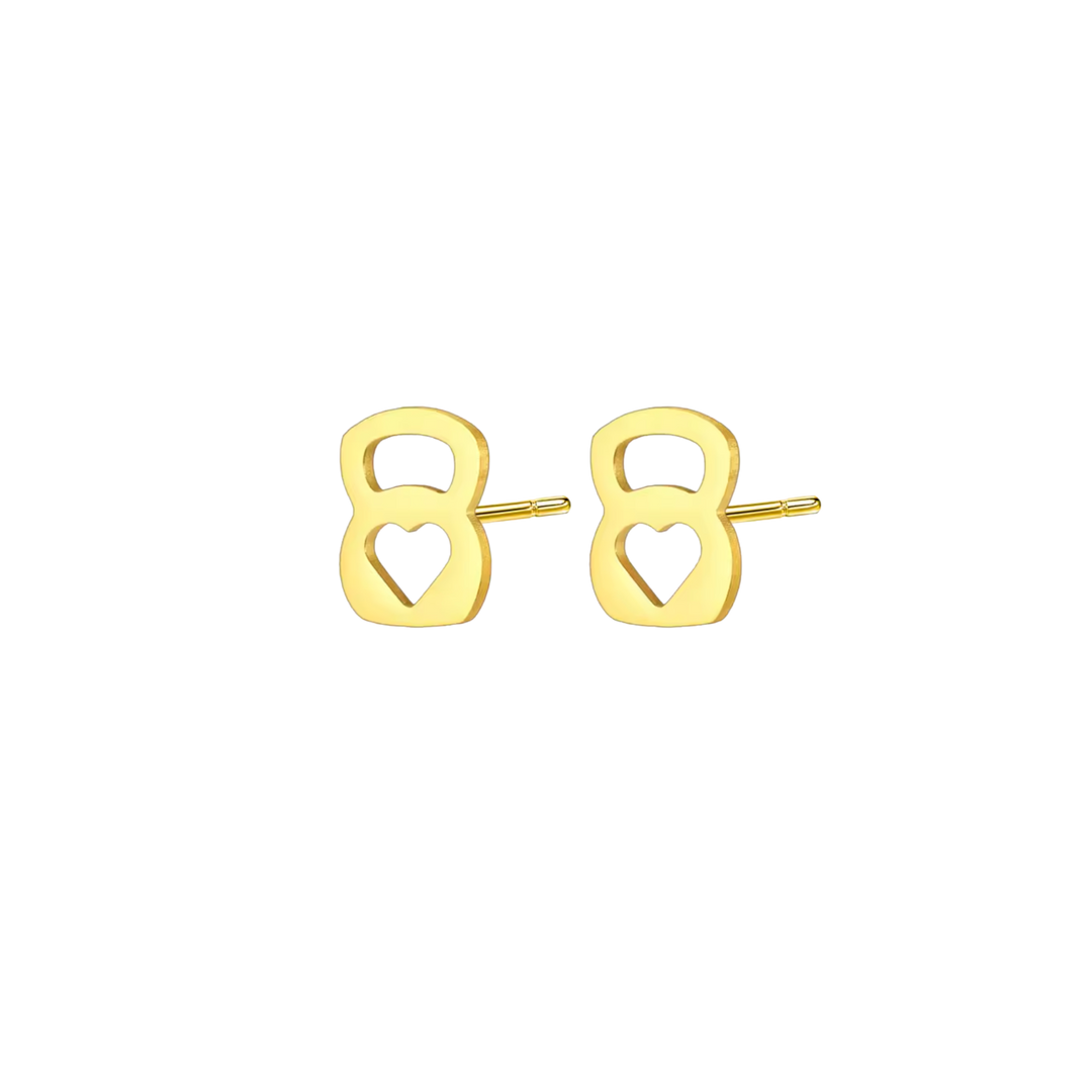 Gold earrings with heart designs on a white background