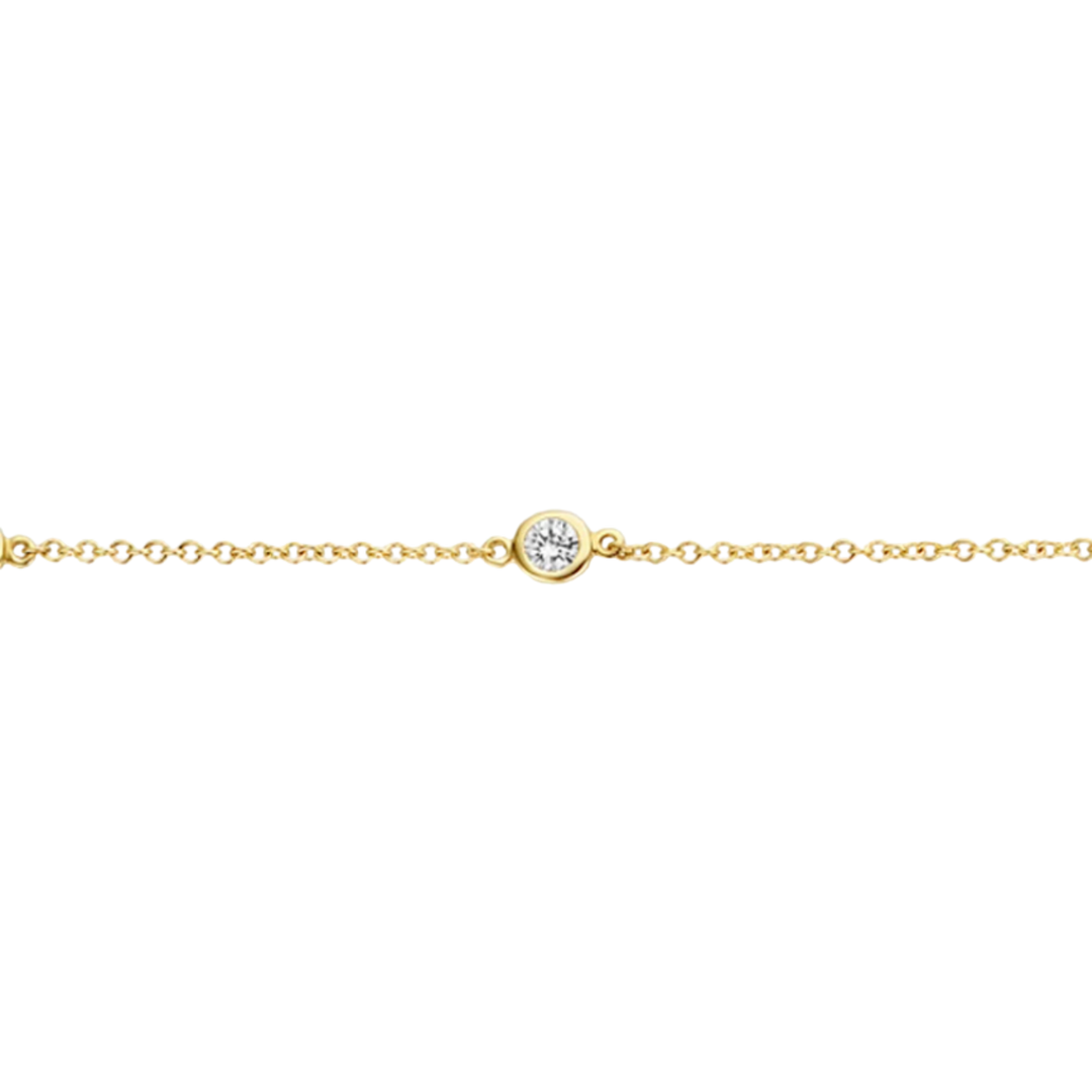 Gold bracelet with a single diamond on a white background