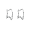 Pair of silver hoop earrings on a white background
