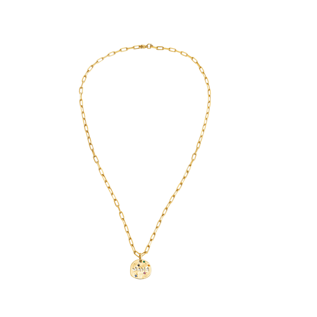 Gold necklace with a round pendant on a white background