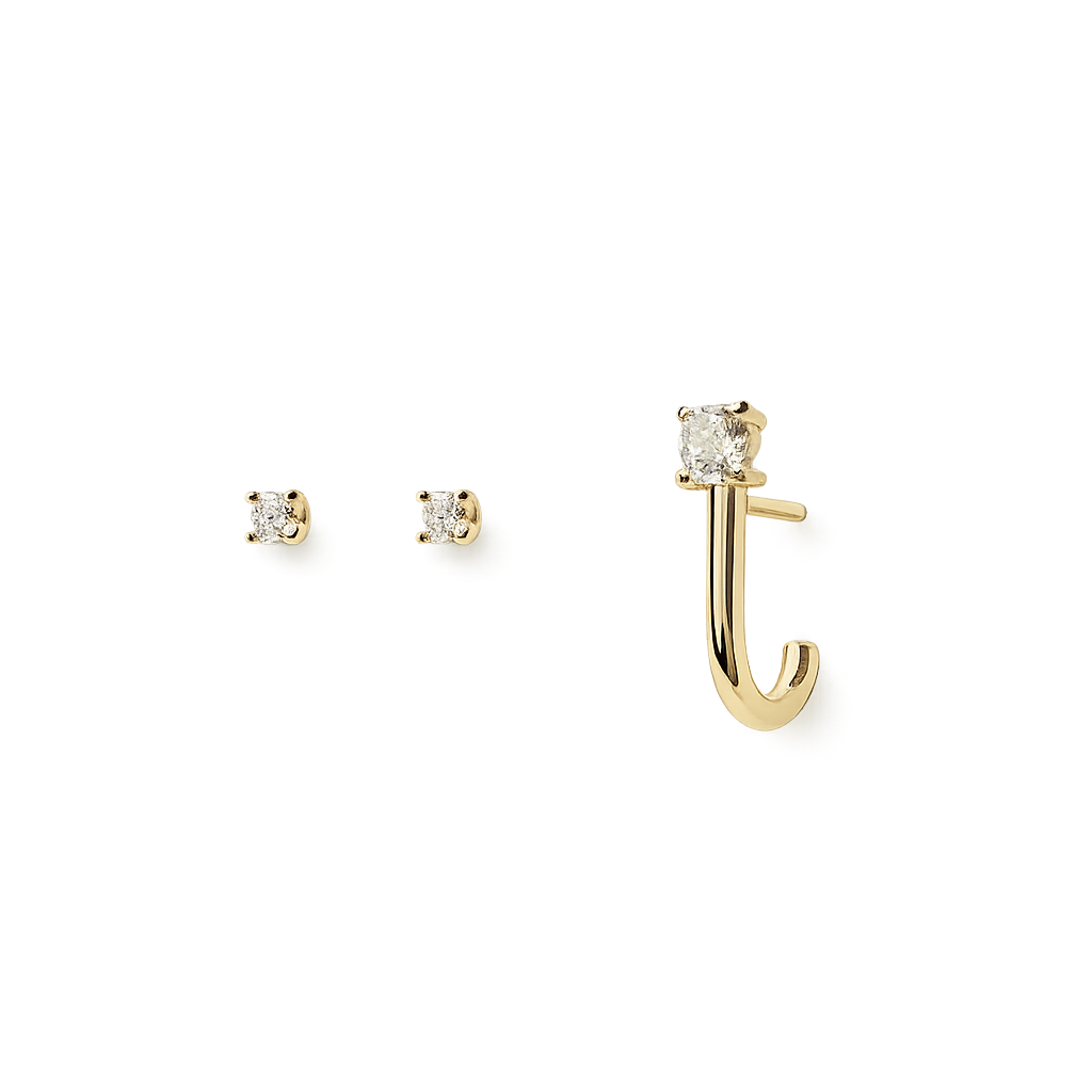 Gold earring and matching stud earrings on a white background