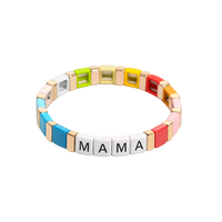 Colorful bracelet with 'MAMA' tiles on a white background