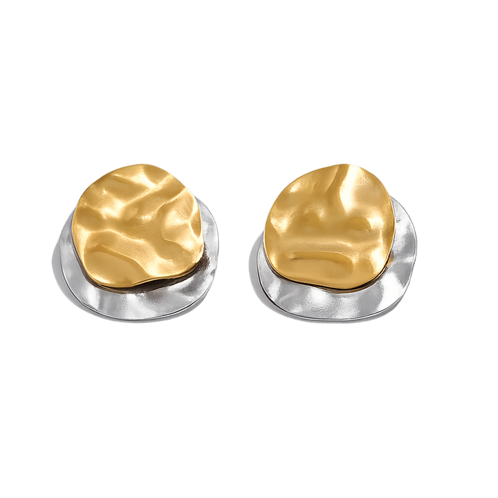 Pair of gold and silver earrings on a white background
