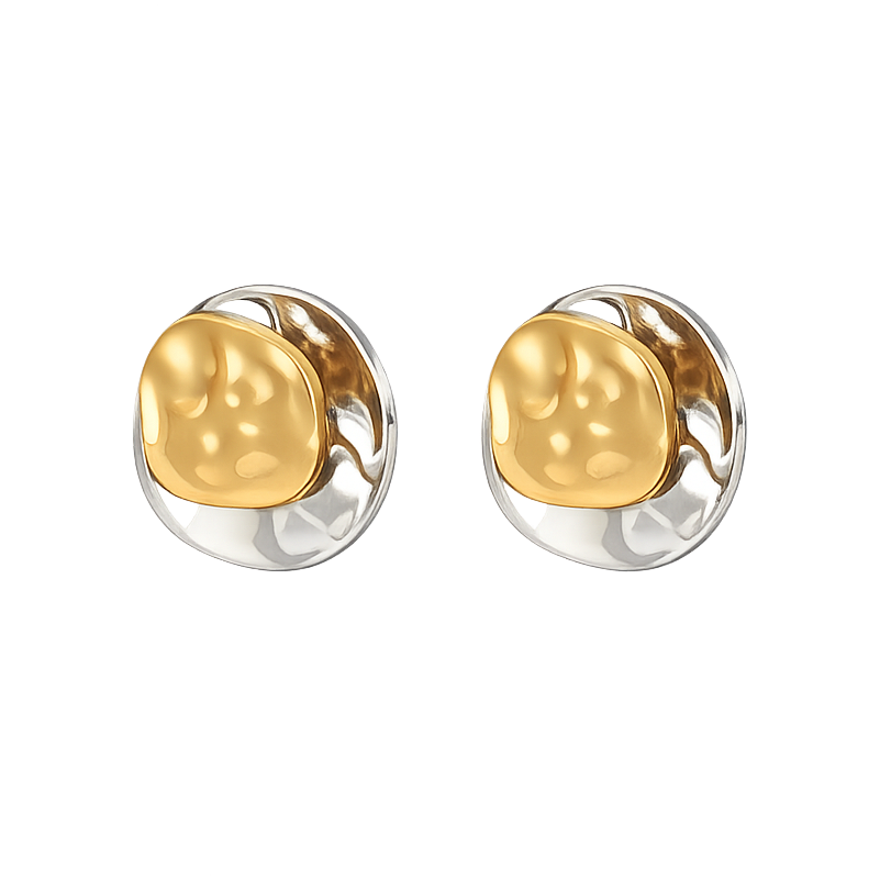 Pair of gold and silver earrings on a white background