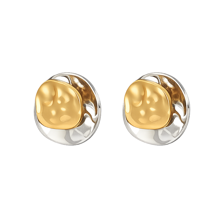 Pair of gold and silver earrings on a white background