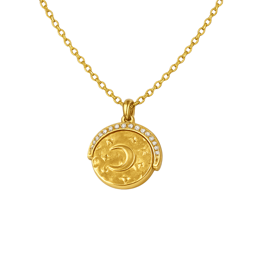 Gold necklace with a round pendant featuring a moon design on a white background