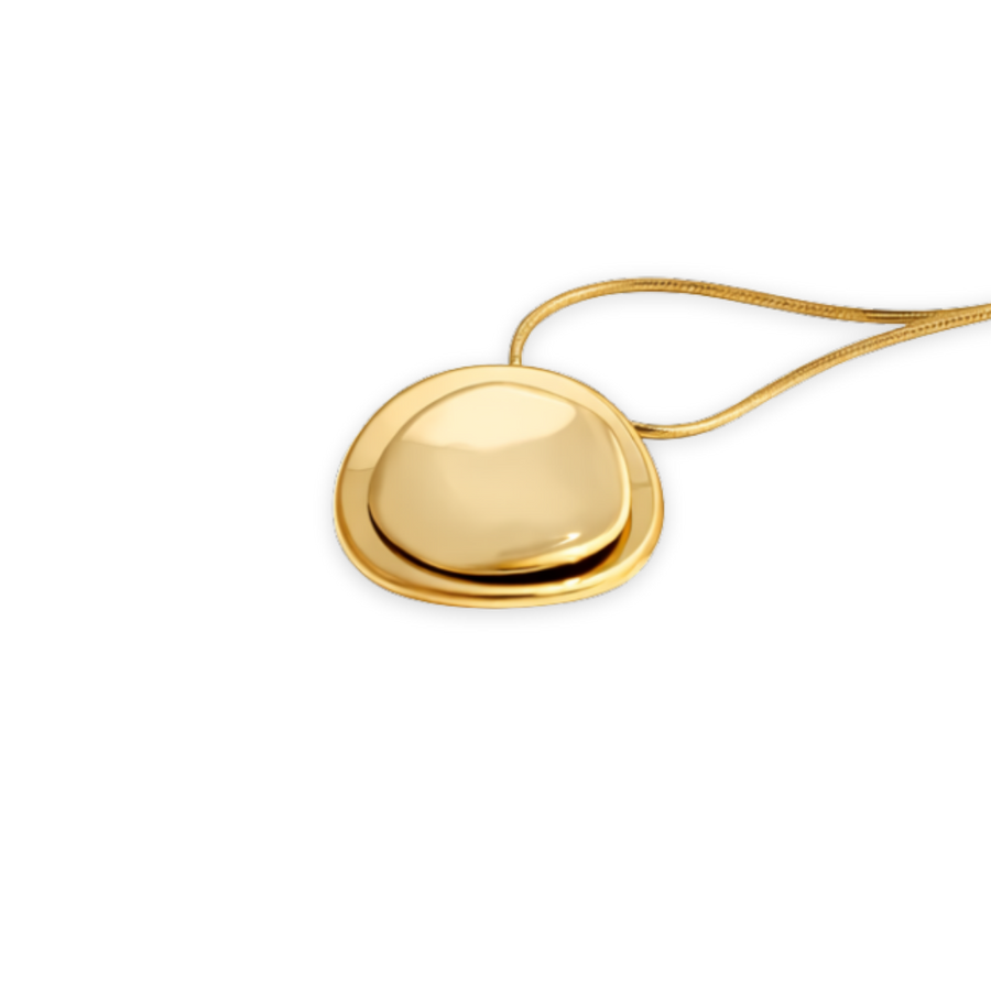 Gold pendant on a white background