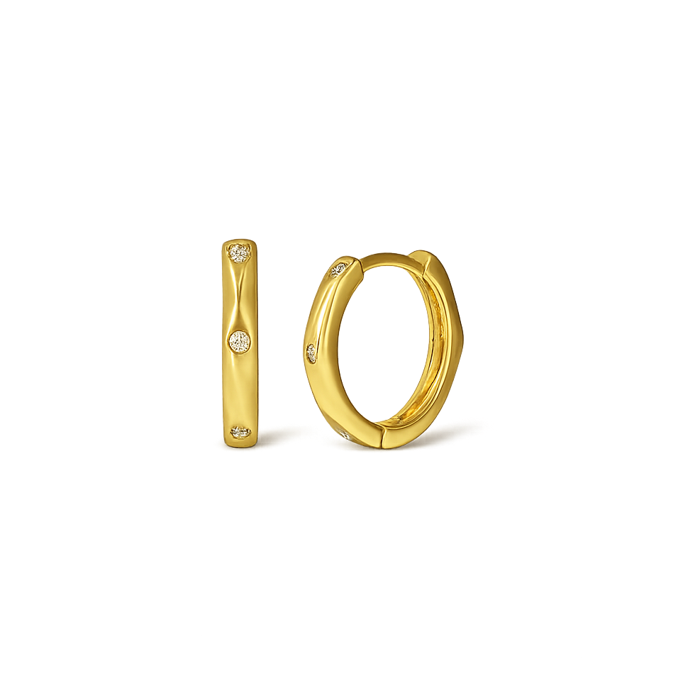 Gold hoop earrings on a white background