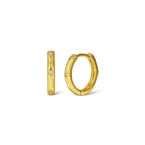 Gold hoop earrings on a white background