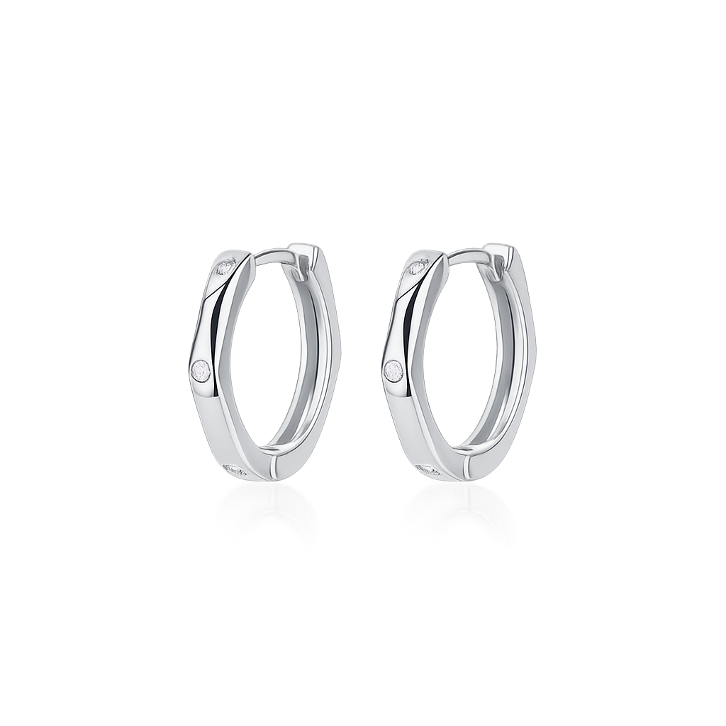 Pair of silver hoop earrings on a white background