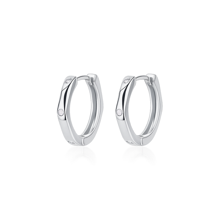 Pair of silver hoop earrings on a white background