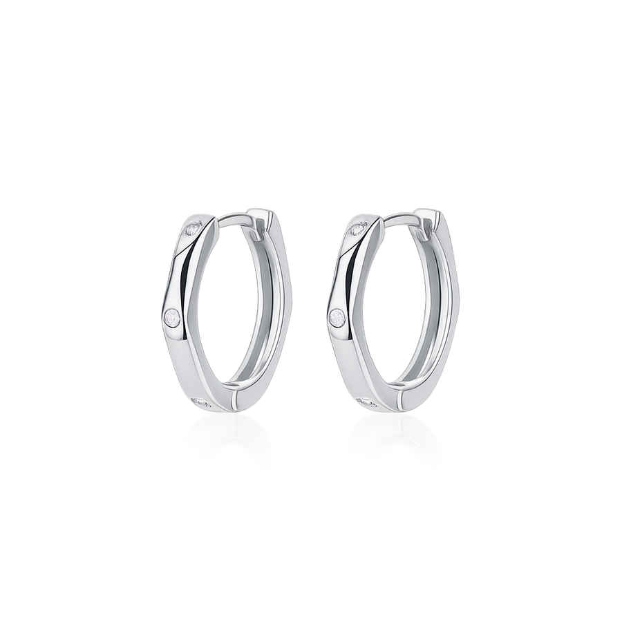 Pair of silver hoop earrings on a white background