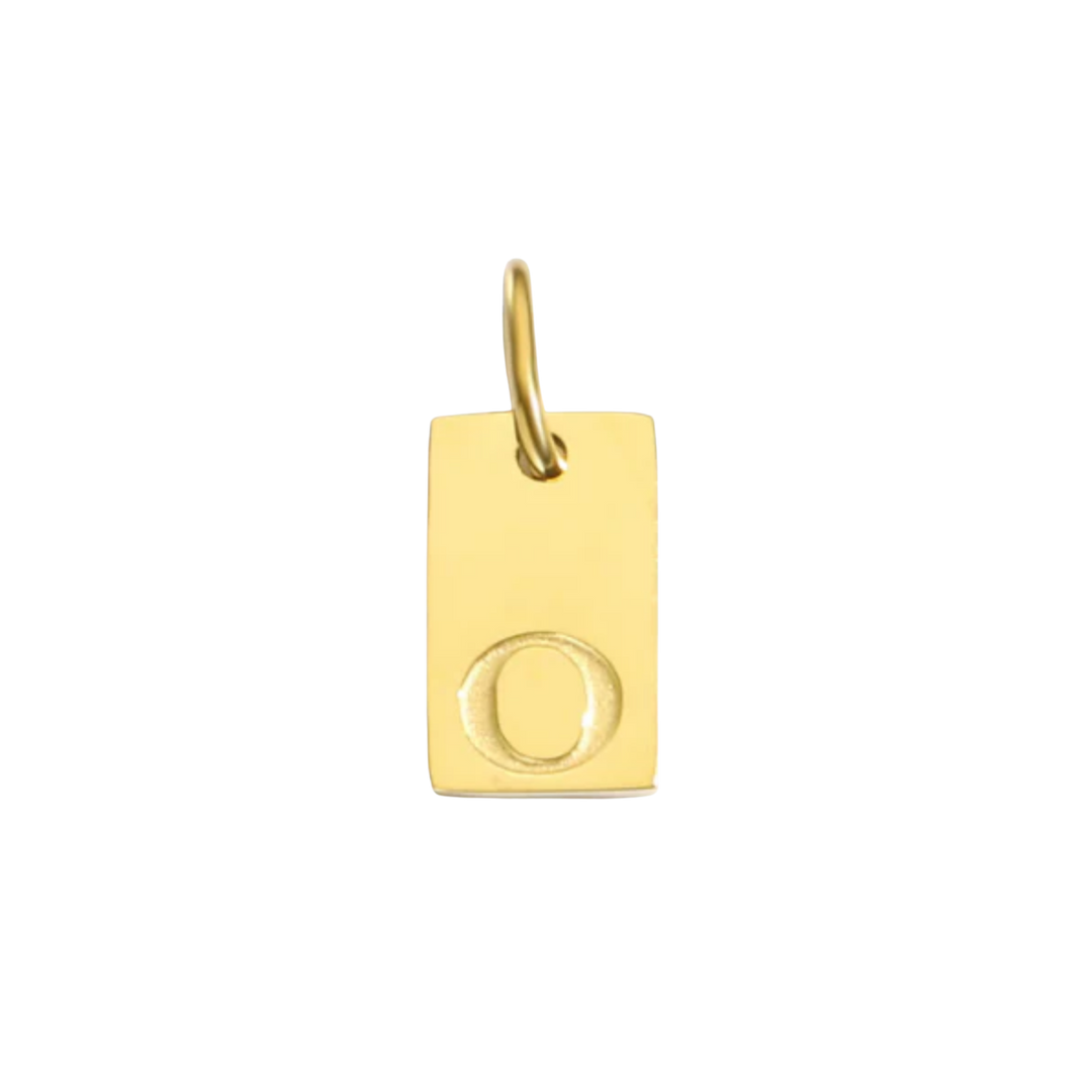 Gold pendant with letter 'O' on a white background