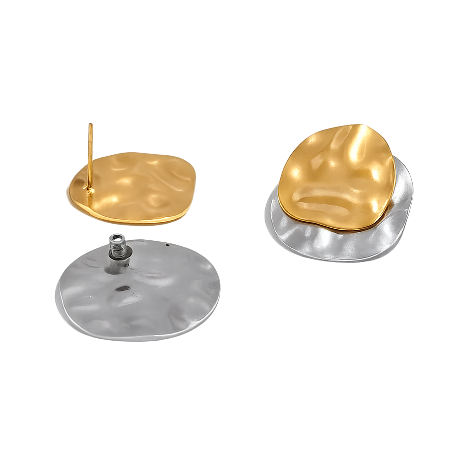 Pair of gold and silver earrings on a white background