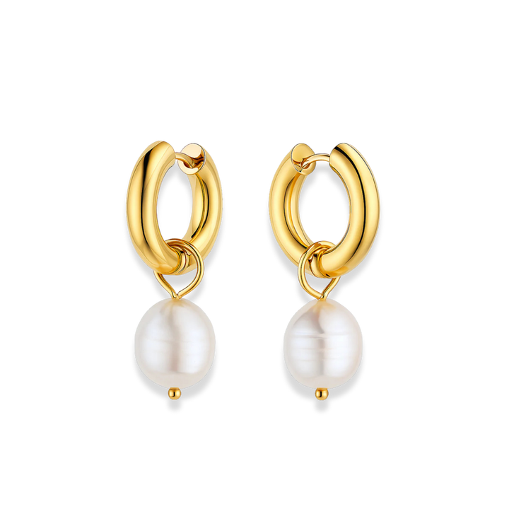 Gold hoop earrings with pearl drops on a white background