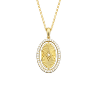 Gold pendant necklace with diamond accents on a white background