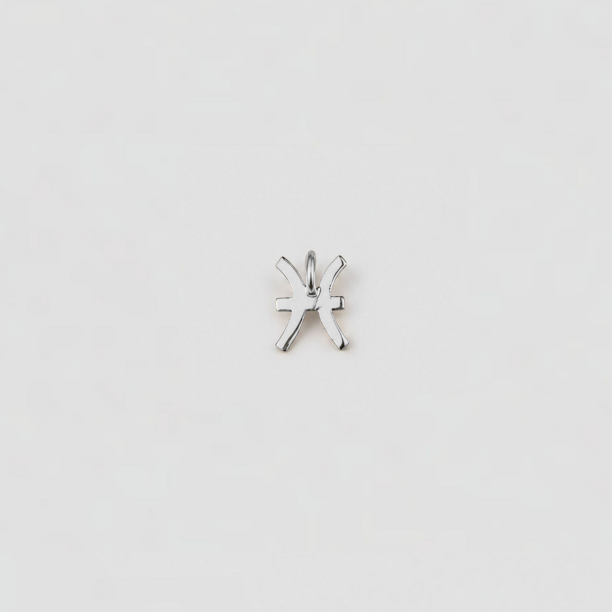 Silver star-shaped pendant on a light gray background