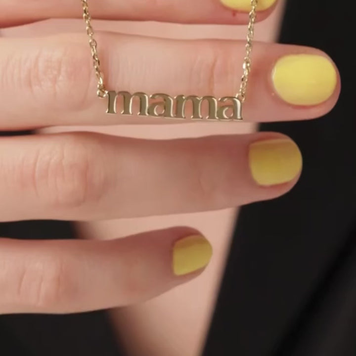 mama necklace video close up in gold