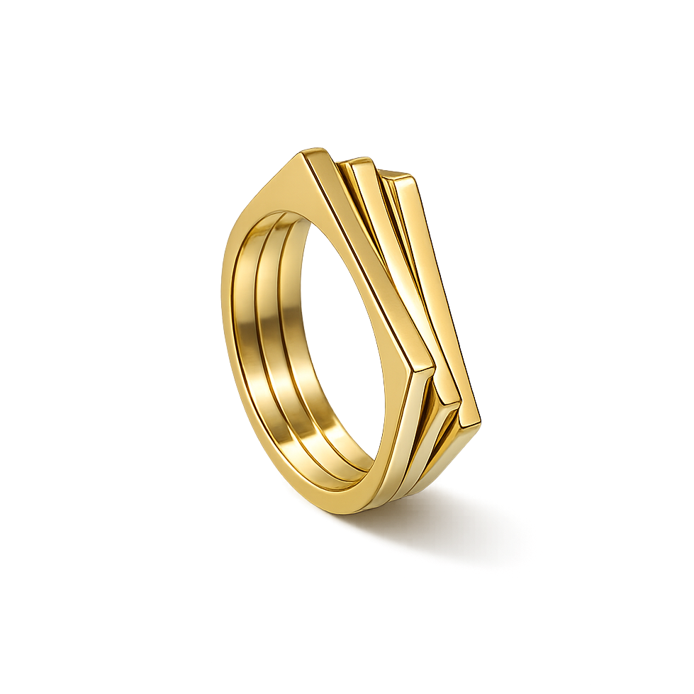 Gold ring with geometric design on a white background