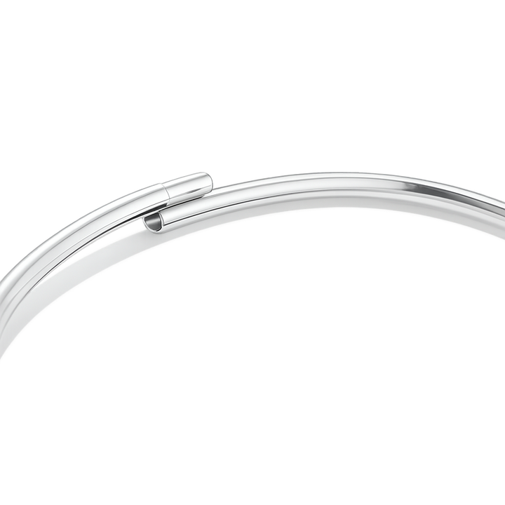 Silver ankle bracelet on a white background