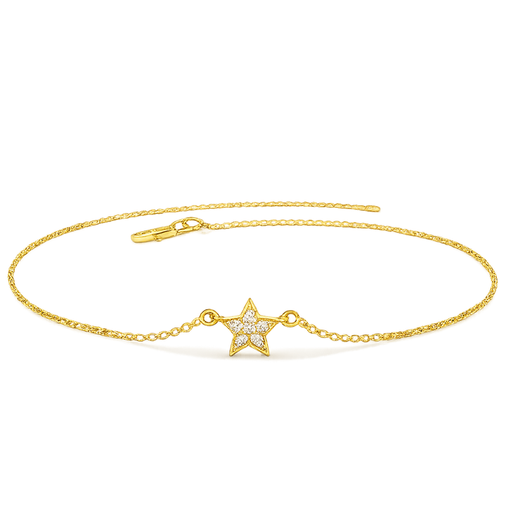 Gold bracelet with a star-shaped charm on a white background