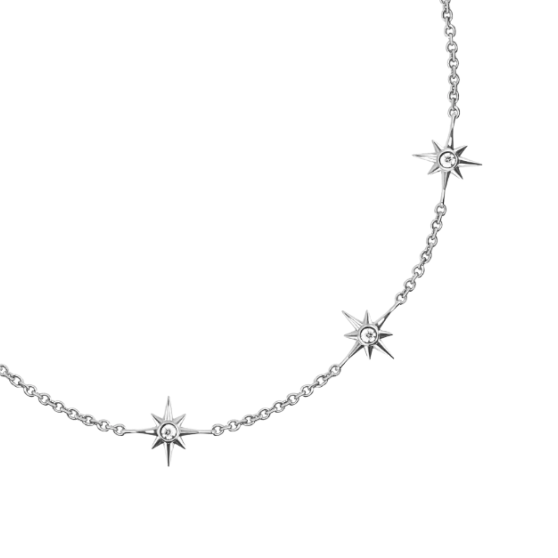 Silver star-shaped necklace on a white background